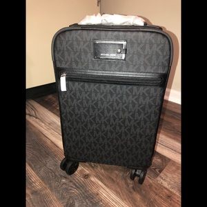 Carry on rolling black suitcase